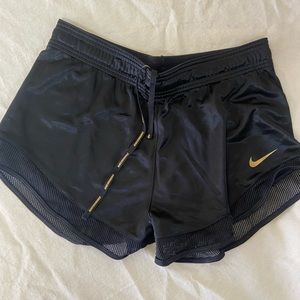 Black silk Nike shorts